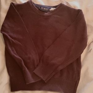 Plum colored boys sweater.